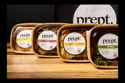 Prept food packaging with labels on a wooden surface