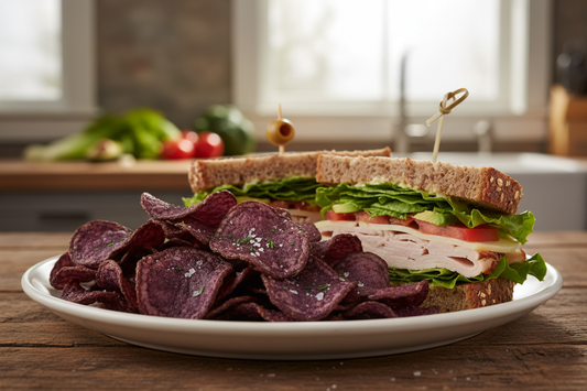 organic purple potato chips on a plate with a sandwich
